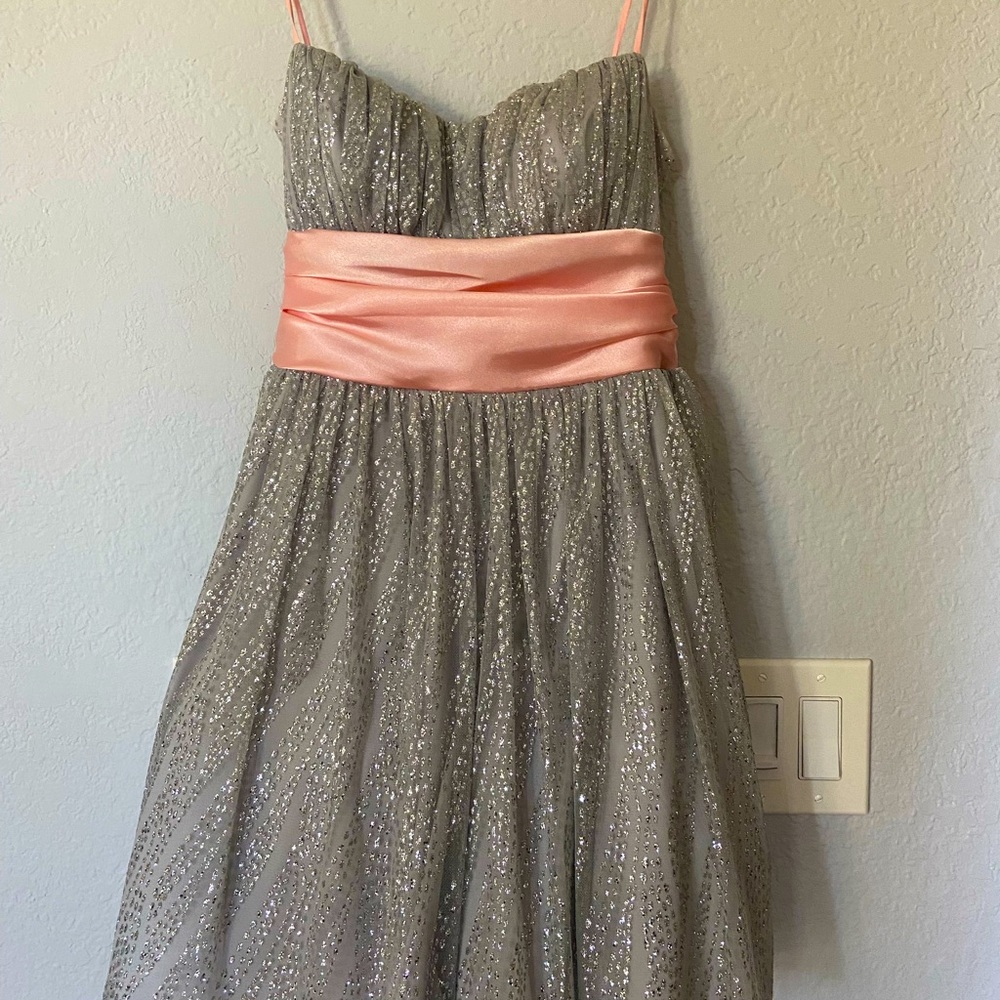 Grey sequin dress with pink ribbon